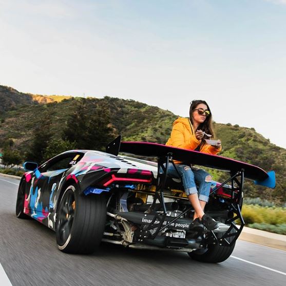 lamborghini-girl-eats-her-cereal-on-the-back-of-a-raging-huracan-124803_1.jpg
